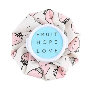 A reusable ice bag with a strawberry pattern provides soothing hot or cold pain relief for injuries and muscle aches.