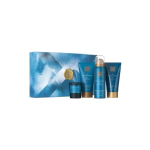 This RITUALS Hammam gift set includes foaming shower gel, body cream, body mud, and a scented candle, all featuring eucalyptus, argan oil, and rosemary scents for a purifying spa experience.