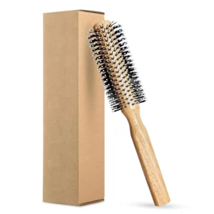 This premium round brush with nylon and boar bristles detangles, smooths, and adds volume for salon-quality hair styling, featuring an ergonomic wooden handle for comfortable control.