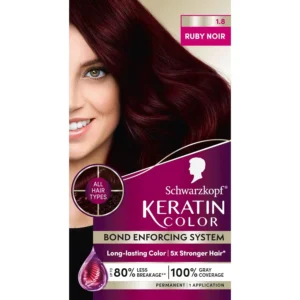 Schwarzkopf Keratin Color Ruby Noir hair dye provides vibrant, long-lasting color with up to 80% less breakage and complete gray coverage, leaving hair soft and smooth.