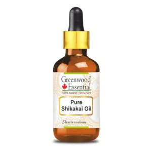 Amber glass bottle of Greenwood Essential pure Shikakai oil with a glass dropper, used as a natural therapeutic grade carrier oil for skin and hair care.