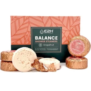 Six grapefruit scented aromatherapy shower steamers tablets for women, designed to relieve stress and balance mood with essential oils.