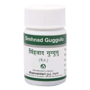 A bottle of Dhanvantari Simhnad Guggulu, an Ayurvedic medicine in tablet form, containing 60 tablets per package.