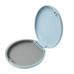 Sky blue Dentosmile slim aligner case is perfect for storing orthodontic retainers and aligners, featuring a magnetic closure and portable design.