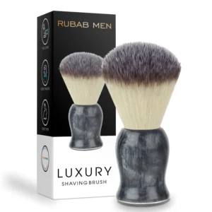 This premium shaving brush features extra soft bristles, a handcrafted grey bomber-toned resin handle, and remarkable water absorption for creating a thick, moisturizing lather and a comfortable shaving experience.