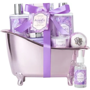 This spa gift basket for women includes lavender-scented bath and beauty essentials like shampoo, bath salts, a soy candle, and a decorative bathtub holder for a luxurious at-home spa experience.