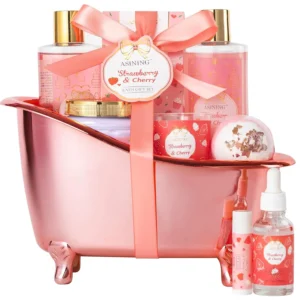 This strawberry scented spa gift basket for women includes bath oil, body lotion, bath salt, shower gel and scented candles for the ultimate at-home relaxation experience.