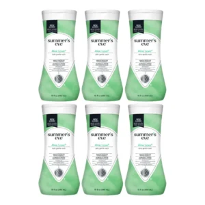 Six bottles of Summer's Eve Aloe Love feminine wash, a gentle, pH-balanced cleanser for odor control, are displayed against a soft background.