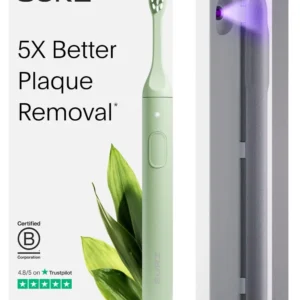 The SURI sustainable electric toothbrush in Winter Fern color is shown with its UV cleaning and charging travel case and magnetic mirror mount.
