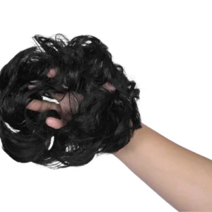 Natural black synthetic hair bun extension adds volume and style for women.