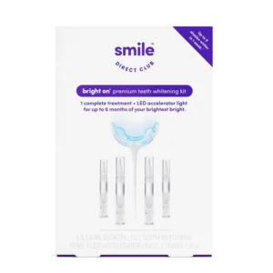 SmileDirectClub teeth whitening kit with LED light and four gel pens for professional strength hydrogen peroxide whitening at home in one week.