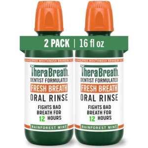 Two bottles of TheraBreath Fresh Breath Rainforest Mint Mouthwash, a dentist-formulated oral rinse accepted by the ADA to fight bad breath for 24 hours.