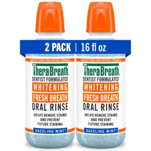 Two bottles of TheraBreath Dazzling Mint Whitening Mouthwash, a dentist-formulated, alcohol-free oral rinse designed to remove stains, prevent future staining, and freshen breath without peroxide.