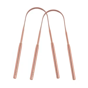 Two gold stainless steel tongue scrapers with ergonomic U-shaped design are shown, highlighting their effectiveness for adults and kids in treating bad breath and promoting oral hygiene.
