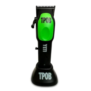 The TPOB YETI professional hair clipper features a turbocharged magnetic 10000 rpm motor, a charging base with a USB-C slot, and six slime green magnetic guards.
