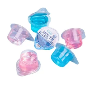 Individually wrapped travel mouthwash with fruit and mint flavor, perfect for portable oral care and fresh breath on the go.