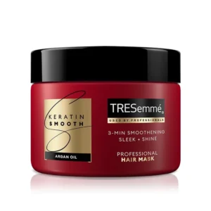 TRESemmé Keratin Smooth Mask infused with keratin and marula oil to moisturize and control frizz, leaving hair silky and manageable.