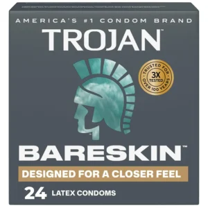 A 24-count box of Trojan Bareskin condoms, known for their thinness and silky smooth lubricant to enhance sensitivity and comfort.