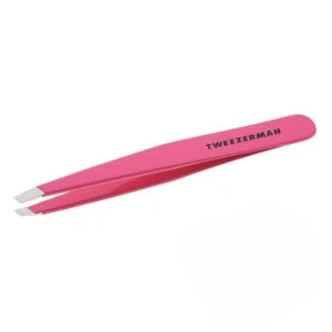 Neon pink Tweezerman Slant Tweezer, an Allure Best of Beauty winner, featuring perfectly aligned, hand-filed tips for precise eyebrow hair removal.