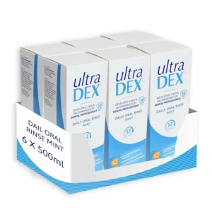 Six bottles of UltraDEX Daily Oral Rinse in mint flavor, designed to protect teeth and gums, restore natural whiteness, and eliminate bad breath for 12 hours.