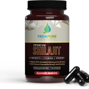 Bottle of Vedapure Shilajit capsules containing a natural Ayurvedic blend with Ashwagandha and Safed Musli extracts for energy, rejuvenation, and enhanced mineral absorption.