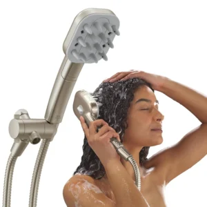 The VersaCurl detangling shower head tool with three interchangeable brush inserts is shown with its hose and diverter valve, offering a gentle detangling experience for curly hair.