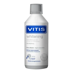 A bottle of Vitis Whitening Mouthwash, 500ml, designed to brighten and whiten teeth.