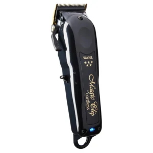 A black Wahl Cordless Magic Clip professional hair clipper with a stagger-tooth blade, ergonomic design, and included accessories for precision cutting.
