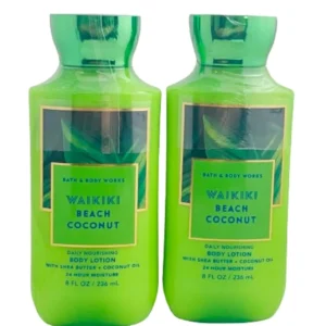 Two bottles of Waikiki Beach Coconut lotion with tropical, white coconut, saltwater, and sun-bleached wood fragrance.