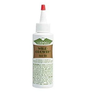 Bottle of Wild Growth Hair Oil to promote hair growth.