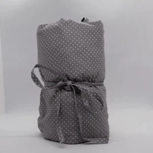 Handmade in Austria, this grey XXL cherry stone pillow contains 14 chambers filled with cherry pits and a cotton cover, weighing approximately 1000 grams.