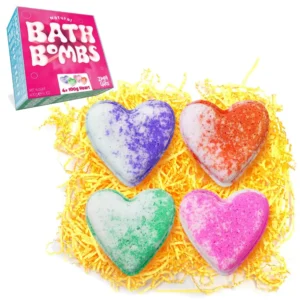 This is a set of four large, love heart-shaped Zimpli Gifts bath bombs, a fizzy spa moisturizing gift set made in the UK that's vegan friendly and ideal for birthdays and anniversaries, perfect for women with dry skin.
